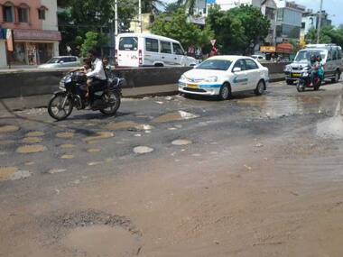 Bengaluru woman crushed to death under truck while avoiding potholes on roads