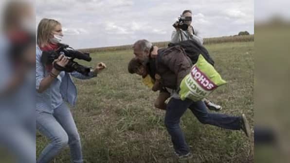 Syrian refugee who was tripped by Hungarian reporter set to coach at Spanish football academy