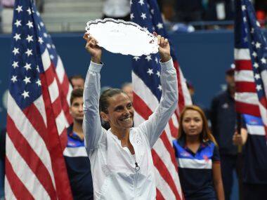 Roberta Vinci won the runner-up trophy and along with it, many a heart at US Open. AFP