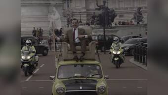 Mr Bean rides again: Rowan Atkinson celebrates 25th anniversary of show at Buckingham Palace