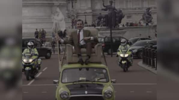 Mr Bean rides again: Rowan Atkinson celebrates 25th anniversary of show at Buckingham Palace