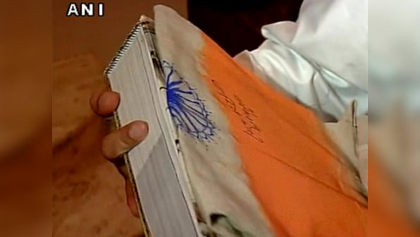 Modi signs the Tricolour: Has the PM run afoul of the Flag Code of India?