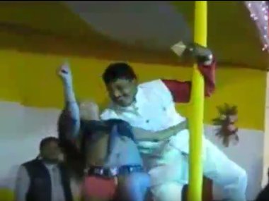 Watch: JD(U) candidate for Bihar polls courts controversy, pole-dances with girl on stage Watch: JD(U) candidate for Bihar polls courts controversy, pole-dances with girl on stage
