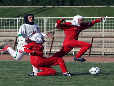 File photo from 2006, Iranian women soccer team player, Niloufar Ardalan, left, during their friendly match at the Ararat stadium in Tehran, Iran. AP