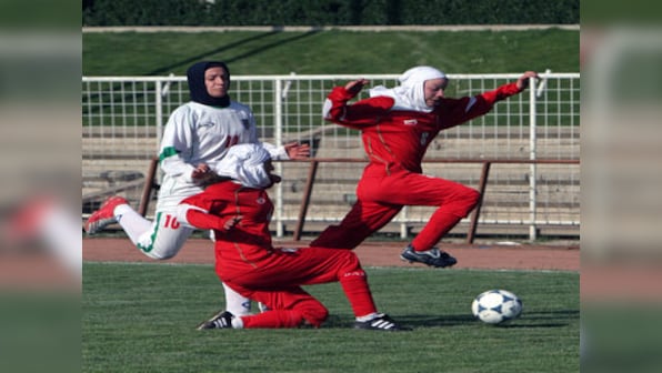 Iranian football star barred from travelling to tournament by her husband