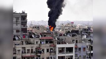 Russian embassy 'shelled' amid fears of military build-up in Syria