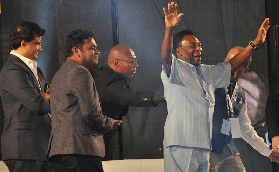 Brazilian football legend Pele (R), former Indian cricket captain and co-owner of the Atletico De Kolkata football club of the Indian Super League (ISL) Sourav Ganguly, and music composer A. R. Rahman pose for photographs during an event in Kolkata, India, October 12, 2015. (SOLARIS IMAGES)