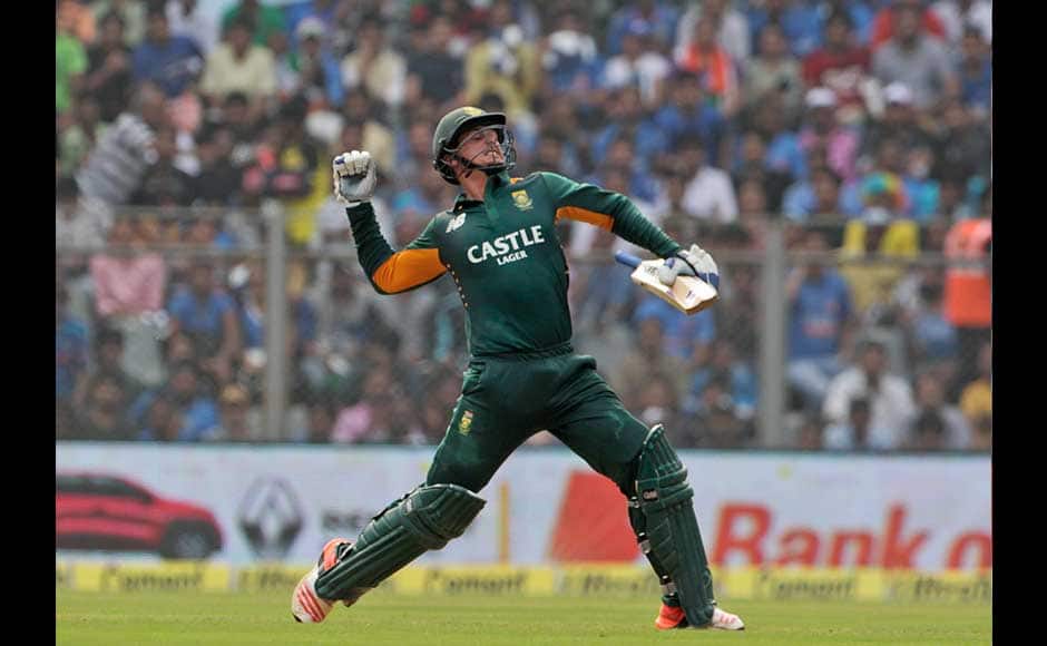 South Africa’s Quinton de Kock celebrates his hundred runs during the final one-day international cricket match of a five-game series against India in Mumbai, India, Sunday, Oct. 25, 2015. (AP Photo/Rajanish Kakade)