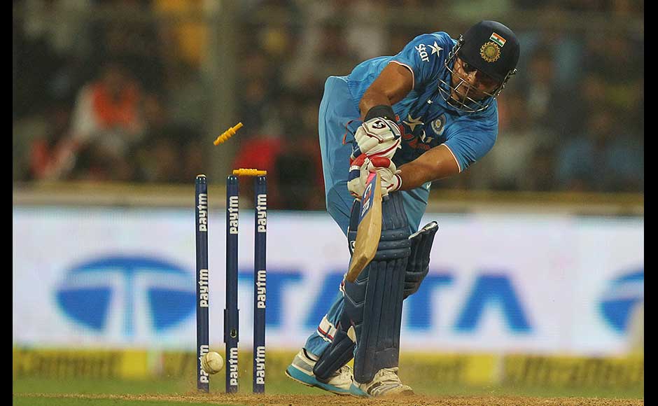 South African Kagiso Rabada, clean bowls India’s Suresh Raina, during the final one-day international cricket match of a five-game series in Mumbai, India, Sunday, Oct. 25, 2015. (AP Photo/Rafiq Maqbool)