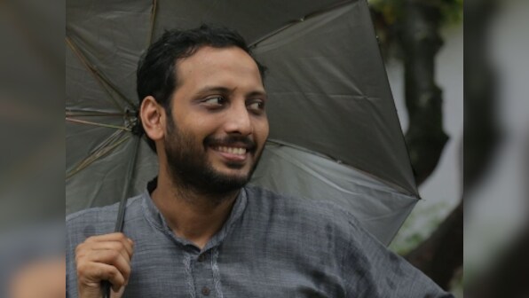 In a quest for religious tolerance, a Muslim professor is taking people out for pork lunch