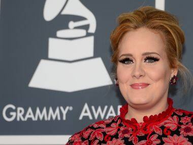 Adele reflects on adulthood with new album '25', says she is making up for lost time