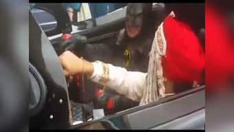 Watch: Desi groom makes grand wedding entrance with Batman in the Batmobile