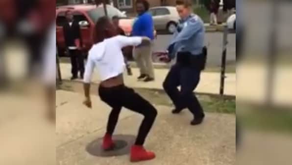 That's how you do it: US cop, teen battle it out in viral dance-off video