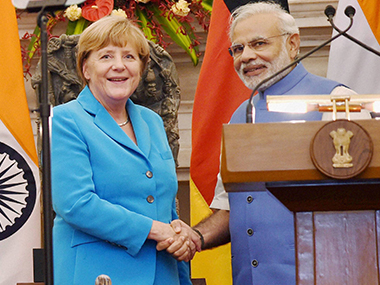 Growing warmth: Modi-Merkel tee off to a new chapter in Indo-German ties Growing warmth: Modi-Merkel tee off to a new chapter in Indo-German ties