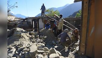 Pakistan earthquake victims battle freezing temperatures as they wait desperately for help
