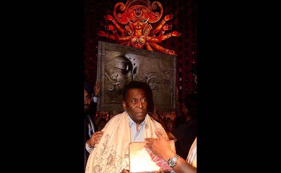 Kolkata: Legendary Brazilian footballer Pele visits at a Durga puja pandal in Kolkata on Monday. PTI 