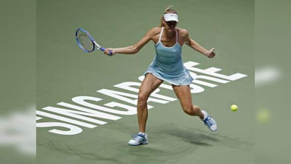 Spotless Sharapova carries Radwanska into semis of WTA finals