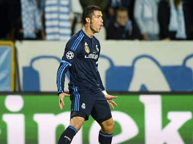 Cristiano Ronaldo celebrates scoring the opening goal against Malmo FF . Reuters