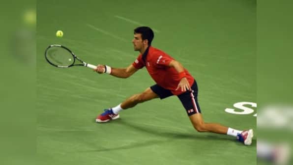 Ruthless Djokovic hammers Tsonga to win Shanghai title