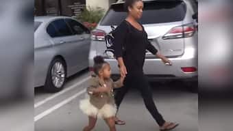 I said no pictures! Kim K and Kanye's two-year-old North West loses her cool at paparazzi
