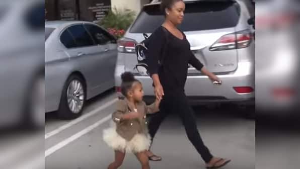 I said no pictures! Kim K and Kanye's two-year-old North West loses her cool at paparazzi