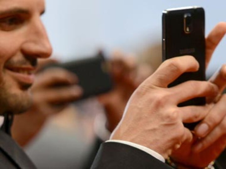 UP official faces axe for clicking selfies during meeting