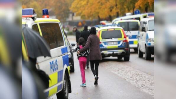 Masked man kills teacher, injures students in sword attack on Sweden school, shot by police