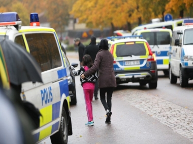Masked man kills teacher, injures students in sword attack on Sweden school, shot by police Masked man kills teacher, injures students in sword attack on Sweden school, shot by police