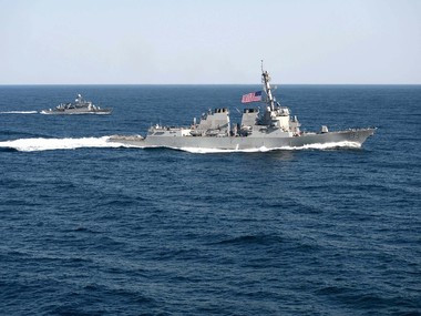 China warns US Navy after ship sails by Chinese-built island China warns US Navy after ship sails by Chinese-built island