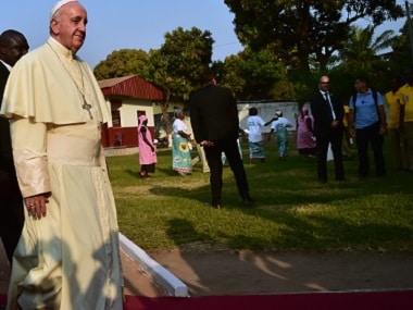 Pope Francis arrives at the Evangelic community in Bangui on Sunday. AFP