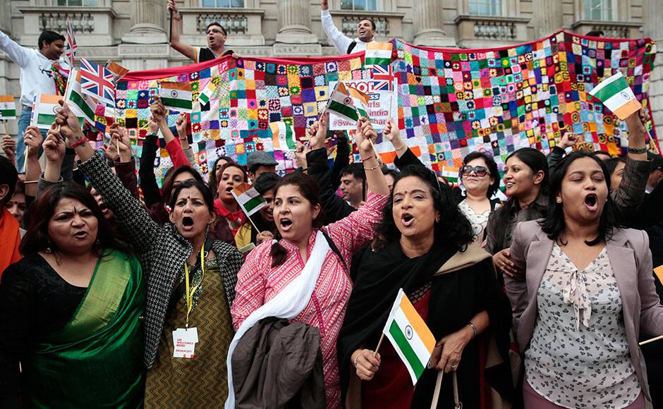 Pro-Modi demontrators shout slogans opposite Downing Street during India's Prime Minister Narendra Modi's official visit, in London, November 12, 2015. REUTERS