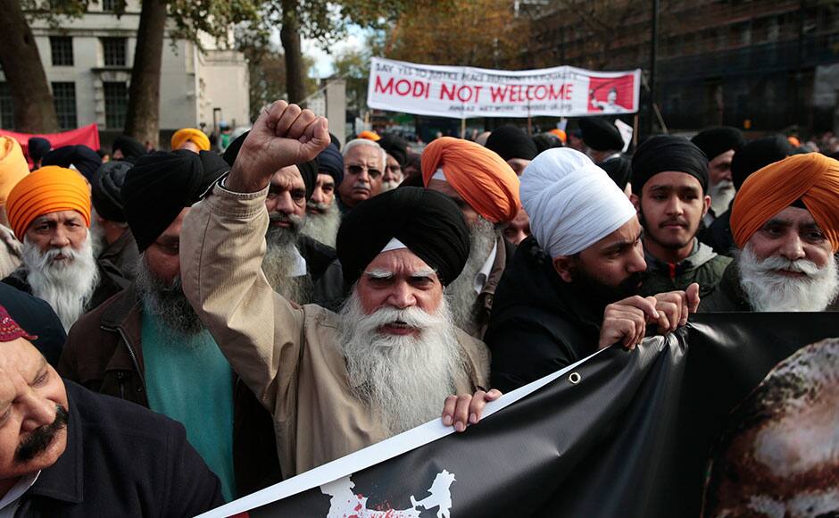 Demontrators protest opposite Downing Street against India's Prime Minister Narendra Modi's official visit, in London, November 12, 2015. REUTERS