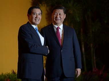 Chinese president Xi Jinping with former Taiwan president Ma Ying-jeou. AFP