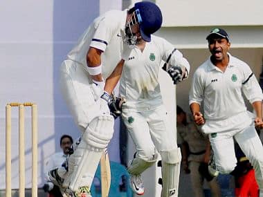 Assam players celebrate after taking the wicket of Gautam Gambhir. PTI