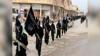 Islamic State militants dig tunnels and sharpen knives as Kerry, Hollande, Putin gang up to bomb Raqqa