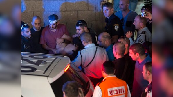 Israel on edge as five people die in attacks by Palestinians in Tel Aviv, West Bank