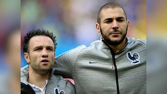 Real Madrid striker Benzema charged in sex tape extortion case; dropped by France