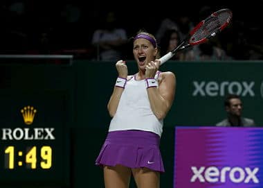 Petra Kvitova celebrates after beating Maria Sharapova. Reuters