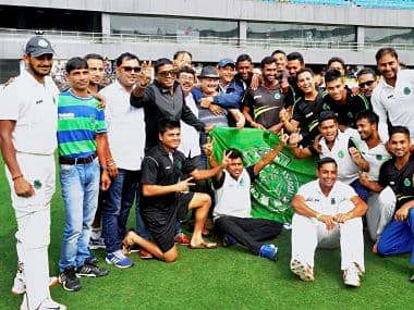 Assam players pose for a group photo after winning the Ranji match against Delhi at Barshapara Cricket Stadium in Guwahati on Wednesday. PTI