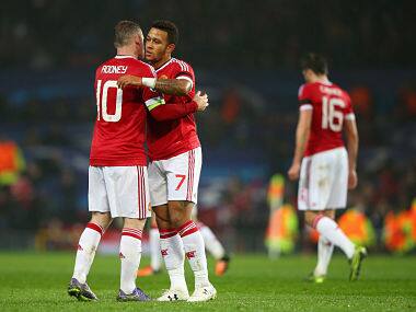 Wayne Rooney and Memphis Depay of Manchester United embrace at the final whistle during the UEFA Champions League Group B match between Manchester United FC and CSKA Moskva. Getty