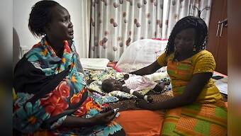 Baby survives South Sudan plane crash cradled in man's arms