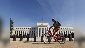 Fed keeps rates unchanged, wary eye on global markets