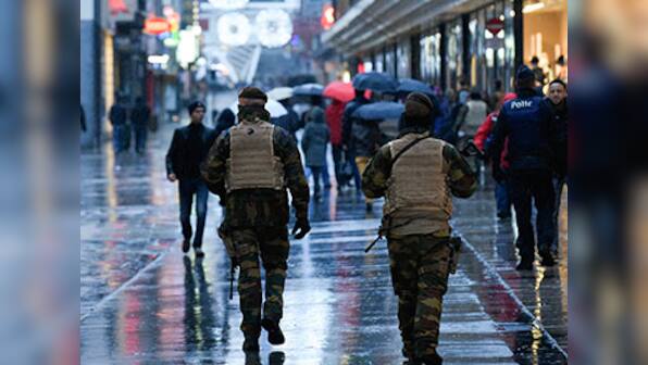 Belgium might extend lockdown as police step up search for Paris attackers
