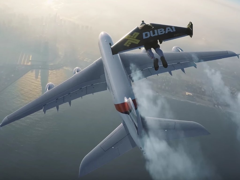 Watch Two Men With Jetpacks Fly Over Tallest Building In Dubai 