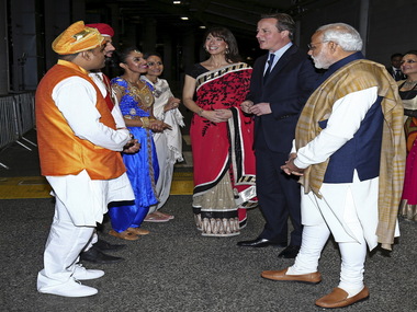 Modi at Wembley sticks to James Bond, Rupee bonds and 'good days are here' rhetoric after Bihar loss Modi at Wembley sticks to James Bond, Rupee bonds and 'good days are here' rhetoric after Bihar loss