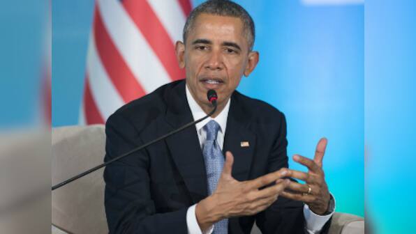 'Every time I think of those kids who were shot, it gets me mad': Teary-eyed Obama pushes for gun control