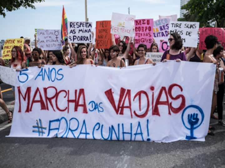 Topless, with slogans scrawled on bare skin, Brazilian women strip to say 'my body, my rules'