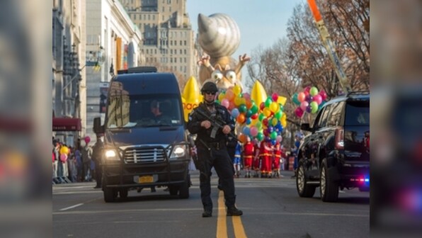 Balloons, floats and heavy police presence at NYC Thanksgiving parade