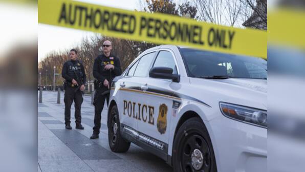Man draped in American flag jumps White House fence, triggering lockdown