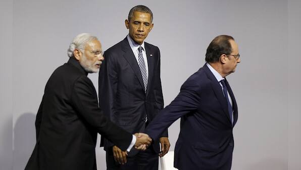 196 countries unite at Paris climate change summit: Modi pledges to reduce emissions by 35 percent